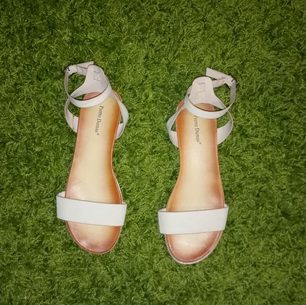 Brand new without tags. Size 10 sandals nude